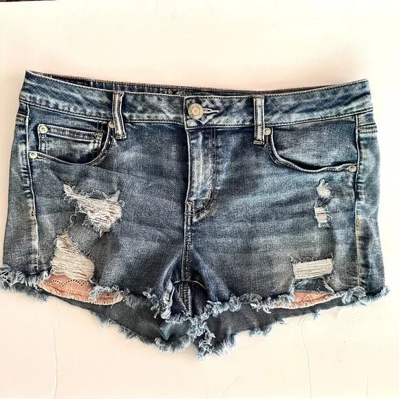 AMERICAN EAGLE DISTRESSED EXPOSED PINK POCKET SHORTIE JEAN SHORTS SIZE 14 - Picture 1 of 10